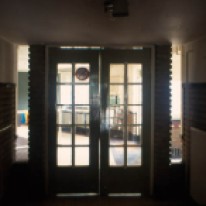 School, Hilversum. Scan of slide taken by author. Dark vestibule following by brightly lit interior. There is also a scale contrast between the two spaces. This is a Wrightian feature but one which I think Dudok developed more consciously.