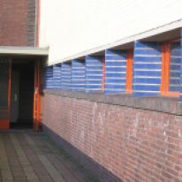 School, Hilversum. Entry and window detail. Again, the paving is a considered part of the architecture which begins the transition from public street space into the interior of the building.